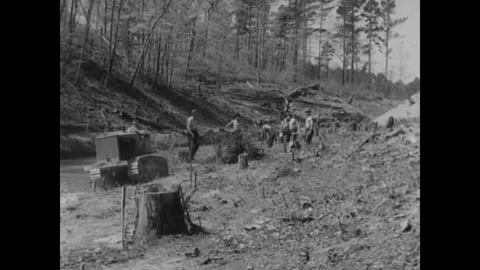 1930s - Constructing river dam in Chewacla Sate Park, Alabama - clearing land Stock Footage 157612422