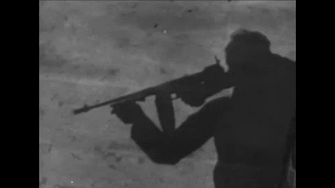 1930s - Cops in training learn how to fire tommy guns, and how to use martial Stock Footage 155854823