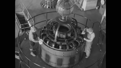 1930s - Excellent aerial view of generators being cleaned at a hydroelectric Stock Footage 241606985