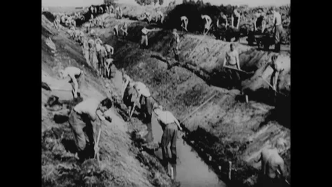 1930s - In this Frank Capra documentary narrated by Walter Huston, men in German Stock Footage 136192557
