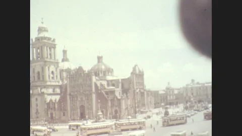1930s: Large church. City square. Mexico City streets and National Palace. Stock Footage