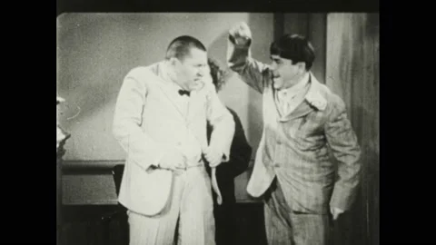 1930s: Larry and Moe help Curly back Stock Video Pond5