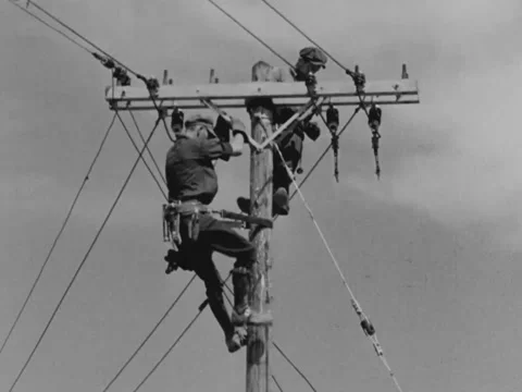 1930s: Linemen at work | Stock Video | Pond5