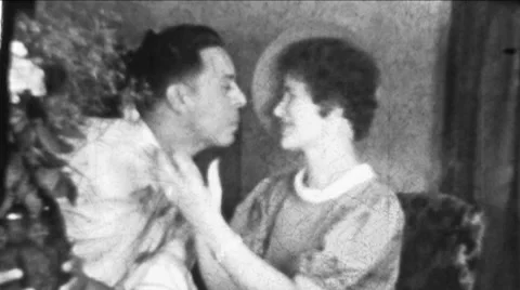 1930s Man Woman KISS Lovers True Love Flowers Valentines Vintage Film Home Movie Stock Footage 57475898