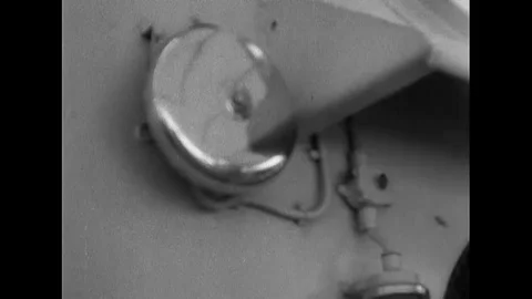 1930s - The mess cook aboard the USS Pennsylvania uses a spud peeler. Stock Footage 106039080