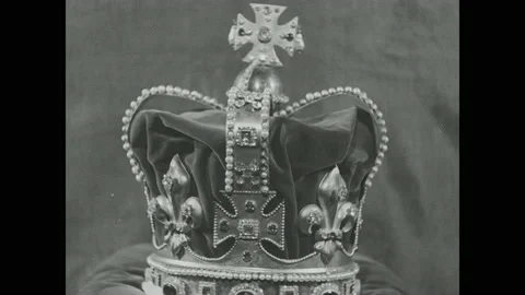 1930s: Replicas of British Crown Jewels on display. Title card. Stock Footage