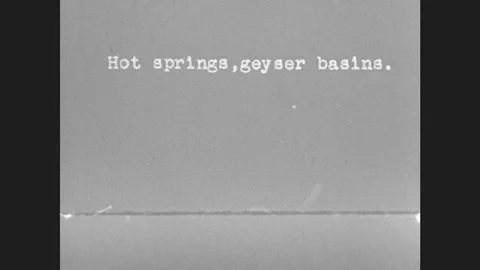 1930s: Title Card Reads Hot Springs,Geyser Basin. Women And Girl Walk In Stock Footage