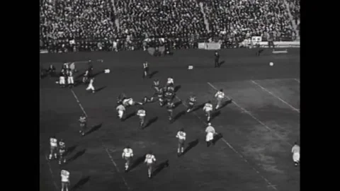 1930s - A touchdown is made in an all star college football game. Stock Footage 155854646