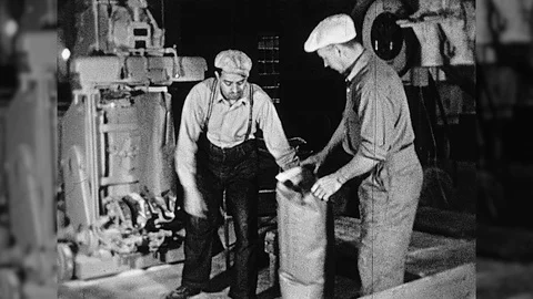1930s Workers Men Salt Bagging Factory Vintage Old Film Industrial Factory Movie Stock Footage