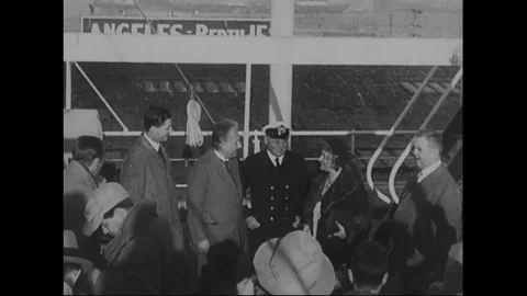 1931 - Albert Einstein and his wife disembark from a ship in California, bound Stock Footage 124142287