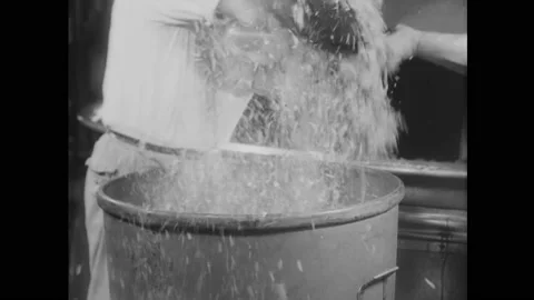 1931 - Janitors clean a cobweb-infested, dirty old factory and get it in working Stock Footage 159137787