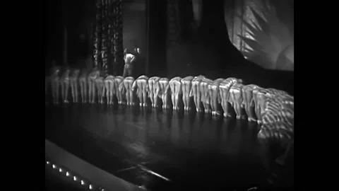 1932 - In this pre-code musical comedy, a group of women dance in a single line Stock Footage 246359784