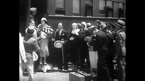 1932 - In this pre-code musical comedy, a woman is introduced to her fans and Stock Footage 246365615