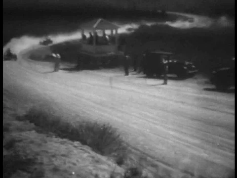 1932 Universal newsreel highlights roadster race on challenging dirt race Stock Footage