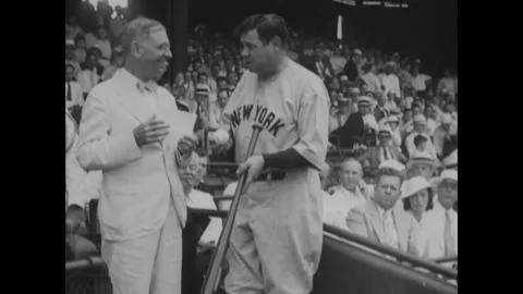 1933 - Babe Ruth presents a baseball bat to War Secretary Dern, who thanks him Stock Footage 229353674