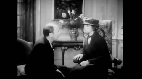 1933 - In this pre-code comedy, a man and woman sit face to face and talk about Stock-Footage 246365472