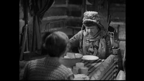 1933 - In this pre-code western comedy, a man breaks a large baguette at the Stockbeeldmateriaal 241783169