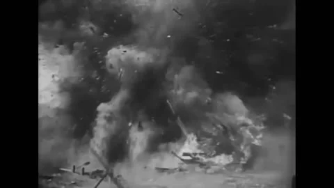 1934 - In this drama, a pilot smiles when he watches a bomb destroy a building. Stock Footage 220286098