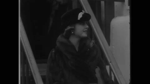 1934 - Heiress Barbara Hutton returns home from a year-long honeymoon while her Stock Footage 217361252