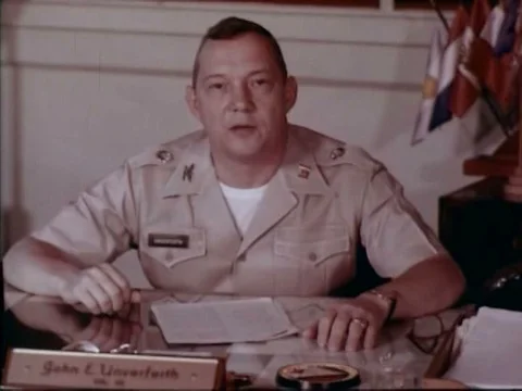 1934- A tiny dog plays in a shoe and near a fishbowl, and farmers turn in their Stock Footage 75190633