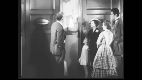 1934 - Will Rogers unveils a painting of Shirley Temple on the 20th Century Fox Stock Footage
