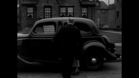 1935-Man / Invention / Vehicle Part Stock Footage