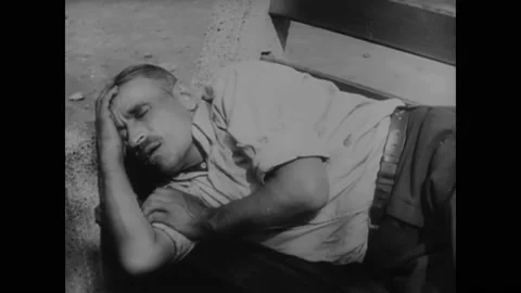 1936 - Poor men get back on their feet with the promise of jobs during the Great Video stock 166833800