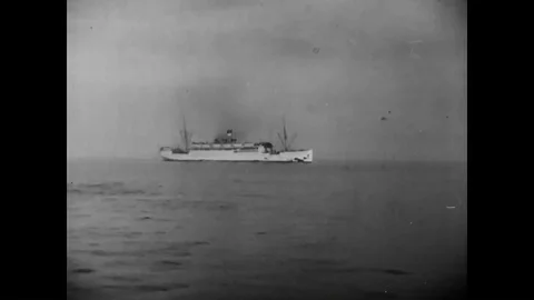 1936- The U.S. Grant pulls into a dock in the Philippines, and traffic on a Stock Footage 85649479