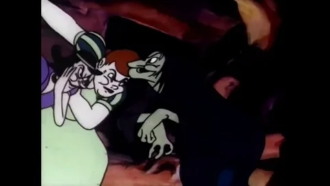 1937 - Animated clip of an evil witch preparing a potion over a fiery caldron. Stockbeeldmateriaal 79451128