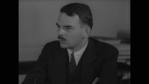 1937 - New York's deputy district attorney Thomas Dewey assures his chief Stock Footage 166830771