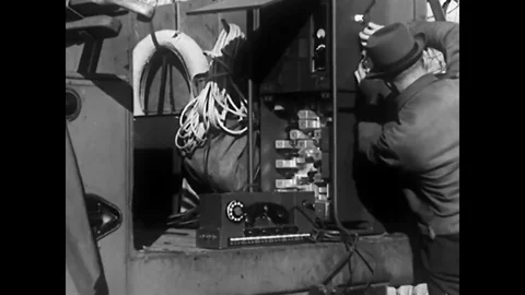 1939 - A gasoline-driven generator, a radio transmitter and receiver and a Stock Footage