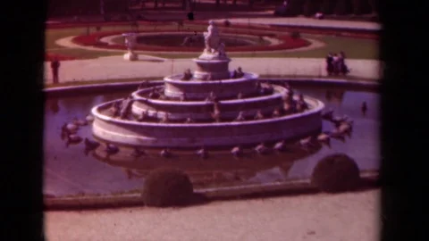 1939: People Moving Around a Large Pond in Paris, France Stock Footage 70656122