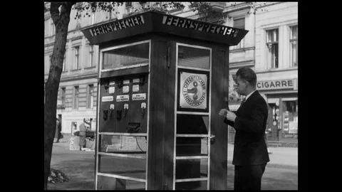 1939-People / Telephone Booth / Germany / 1933 - 1939 Stock Footage