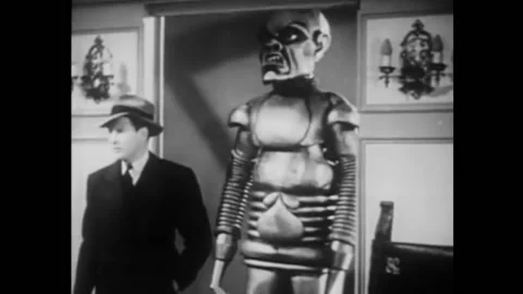 1939 - In this Sci-Fi horror serial, a robot monster emerges from a trap door Stock Footage 218365827