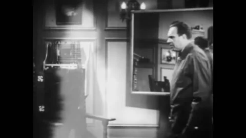 1939 - In this Sci-Fi horror serial, a man puts on a belt and disappears from in Stock Footage 218365915