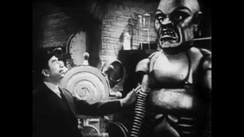 1939 - In this Sci-Fi horror serial, a scientist creates a monster robot and Stock Footage 218366000