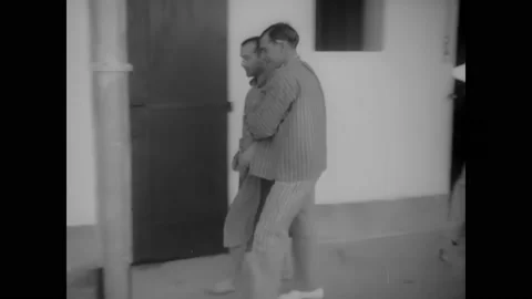 1939 - Water is thrown into a prisoner's cell on Devil's Island. Stock Footage 166830800
