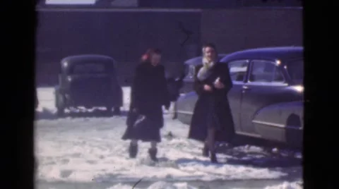 1939: women walking past cars LOS ANGELES, CALIFORNIA Stock Footage