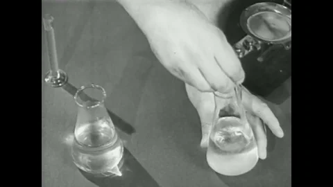 1940 - A chemical fixing solution is created for developing celluloid. Video stock 99103670