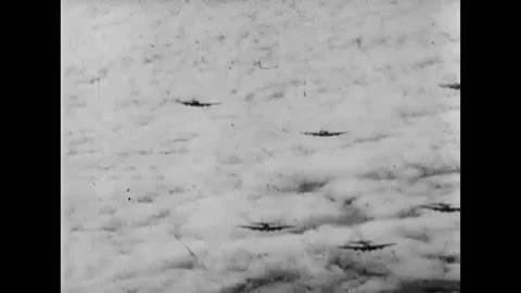 1940 - GERMANY - German planes shoot down US planes. Stock Footage 254072949