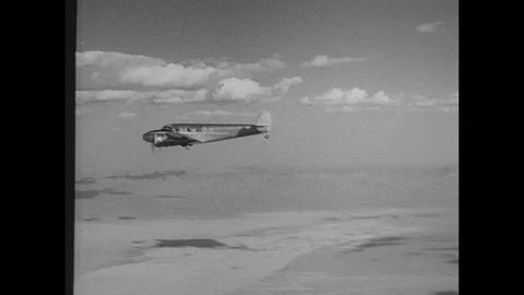 1940-Lockheed 12 Electra Junior / Flying / 1935 - 1940 Stock Footage 77890333
