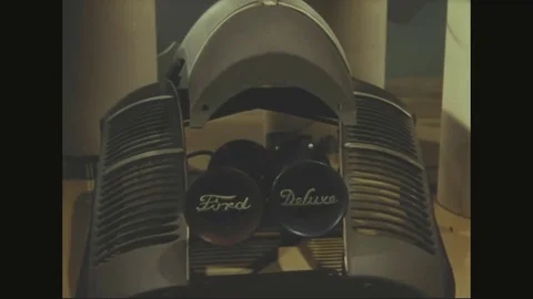 1940 - In this stop-motion sequence, tiny car parts are used to assemble a ship Video stock 84789345