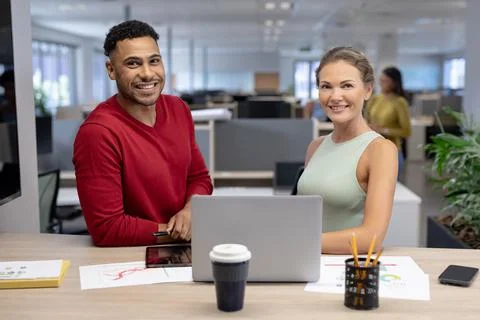 Portrait of happy multiracial male and female advisors with laptop at desk in modern workplace. unaltered, business, teamwork, modern office and technology concept. xkwx Four People, Young Adult, Man, Male, Mixed-Race, Woman, Female, Black, Mid Adult, Caucasian, People, Portrait, Happy Multiracial, Male Female, Advisor, Laptop, Desk, Modern Workplace, Unaltered, Business, Teamwork, Office, Technology Concept, Computer, Work, Businessman, Workplace, Internet, Team, Professional, Communication, Corporate, Job, Person, Notebook, Technology, Finance, Young, Meeting, Businesswoman, Adult, Success, Happy, Multiracial, Modern, Concept