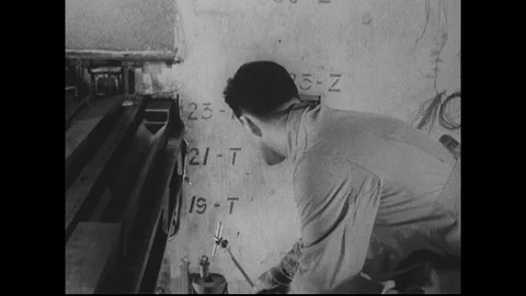 1940s-1950s : A scientist drops canister of radioactive material into a heavy Stock Footage