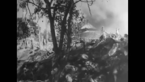 1940s - After the explosion of a small building Chinese troops are running Stock Footage 232894115