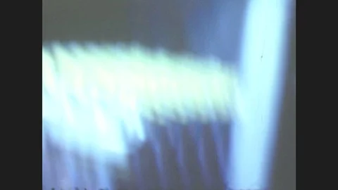 1940s: Alaska: Cans Of Fish In Cannery. Hands Prepares Fish For Cans. Men Shakes Stock Footage