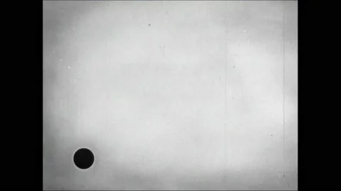 1940s: Animated atoms explode and split. Dot flies toward Japan on map. Text Video stock 162046081