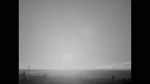 1940s: Atomic bomb explosion. Mushroom cloud raises into sky. Stock Footage 158447597