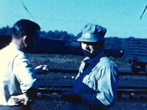 1940s Blue Collar Worker/Train Engineer Talking to a Supervisor Vídeos de archivo 336408048