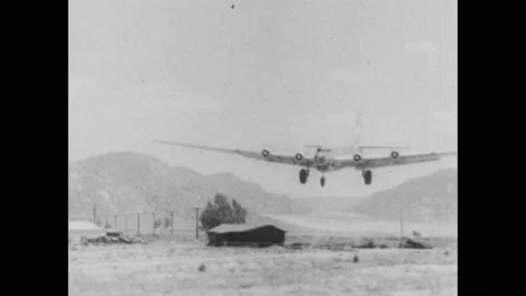1940s: Bomber B-19 plane lands on runway. Plane bounces a few time on runway on 動画素材 232949245